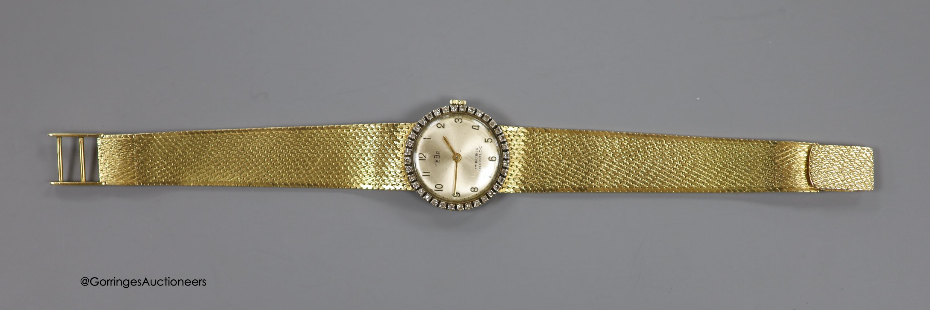 A lady's 18k and diamond set EBP manual wind wrist watch on an integral 750 mesh link bracelet, overall 19.5cm, gross weight 46.3 grams